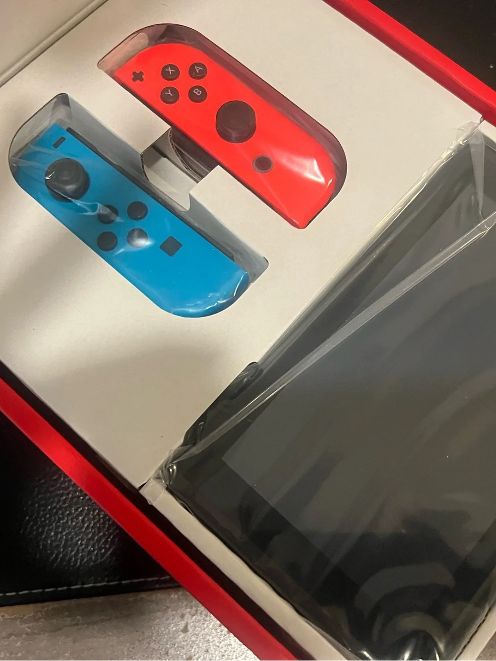 Nintendo Switch Console with Blue and Orange Joy‑Con